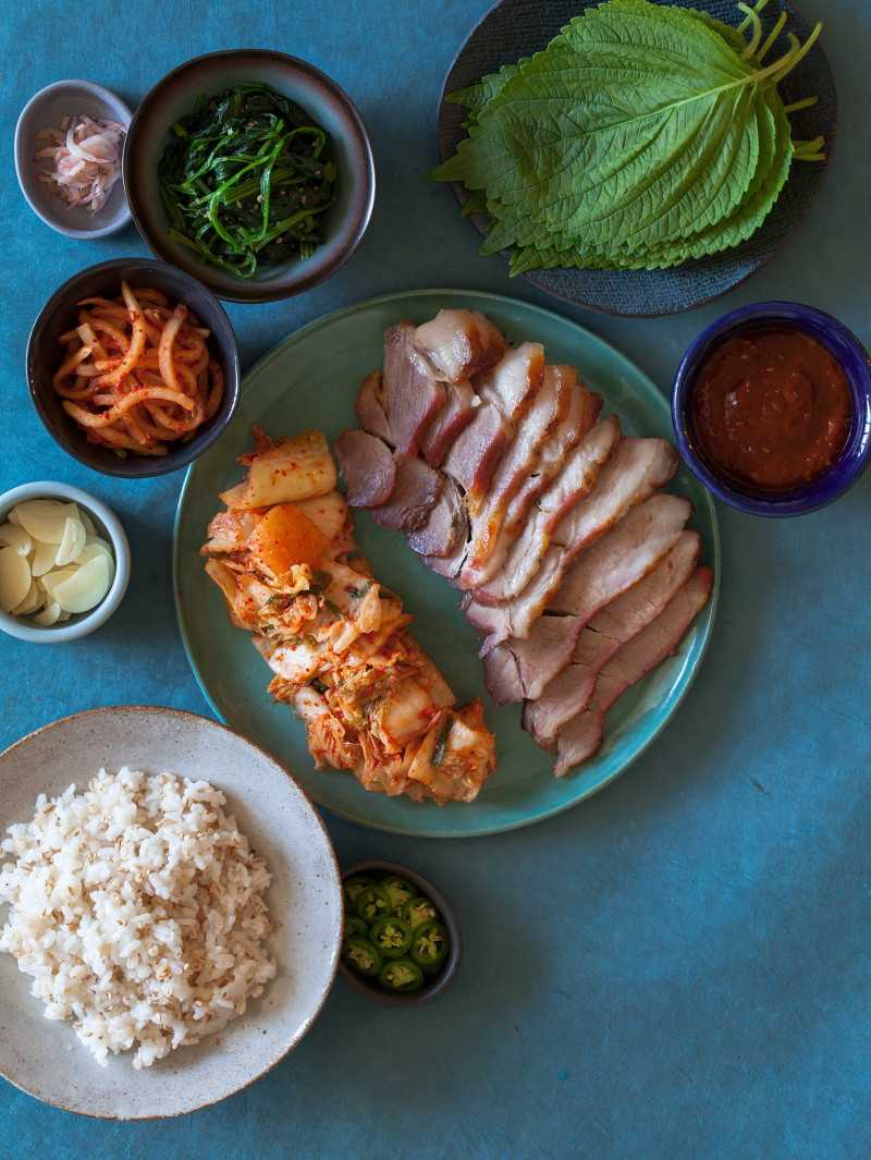 Ingredients in bowls and on plates for bo ssam.