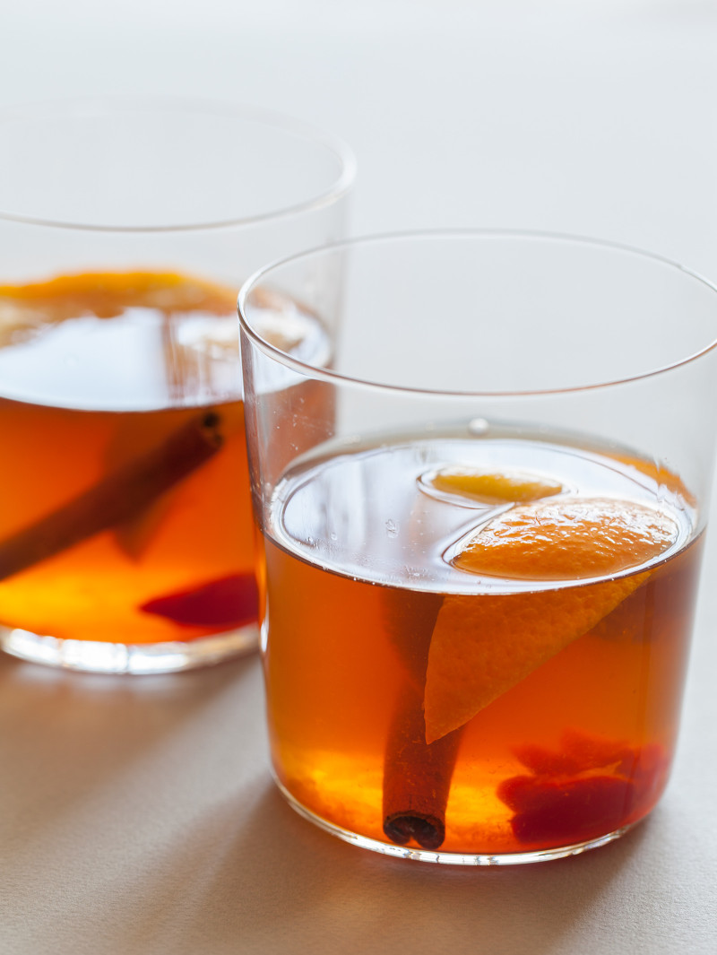 The perfect winter cocktail, a Winter Spiced Old Fashioned with cinnamon, star anise, cardamom, cherries, and orange slices. 