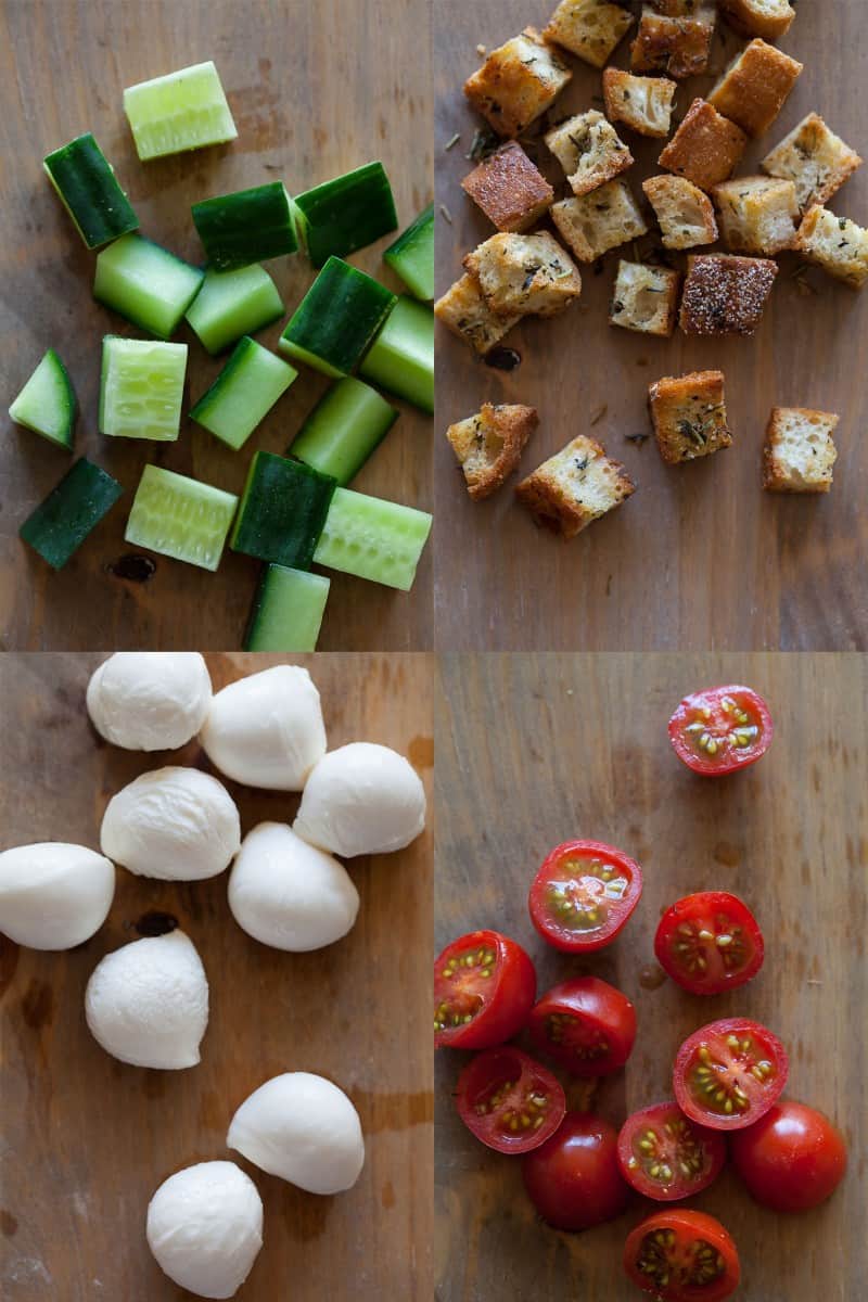 Ingredients for a Panzenella Salad. Cucumbers, toasted cubed bread, mozzarella, and cherry tomatoes.