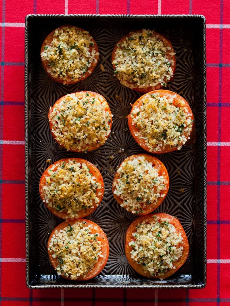 A recipe for Tomatoes baked with parmesan, bread crumbs, and spices.