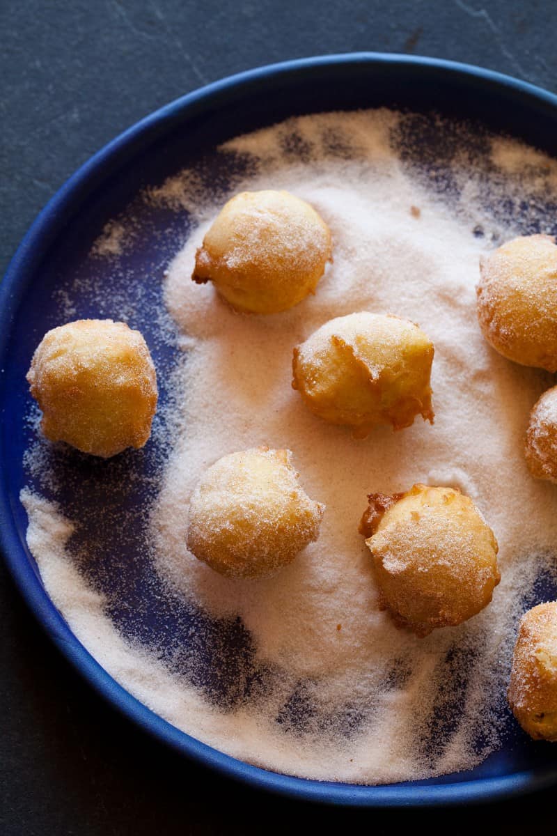 Cinnamon sugar doughnut hole recipe with a spicy chocolate sauce.