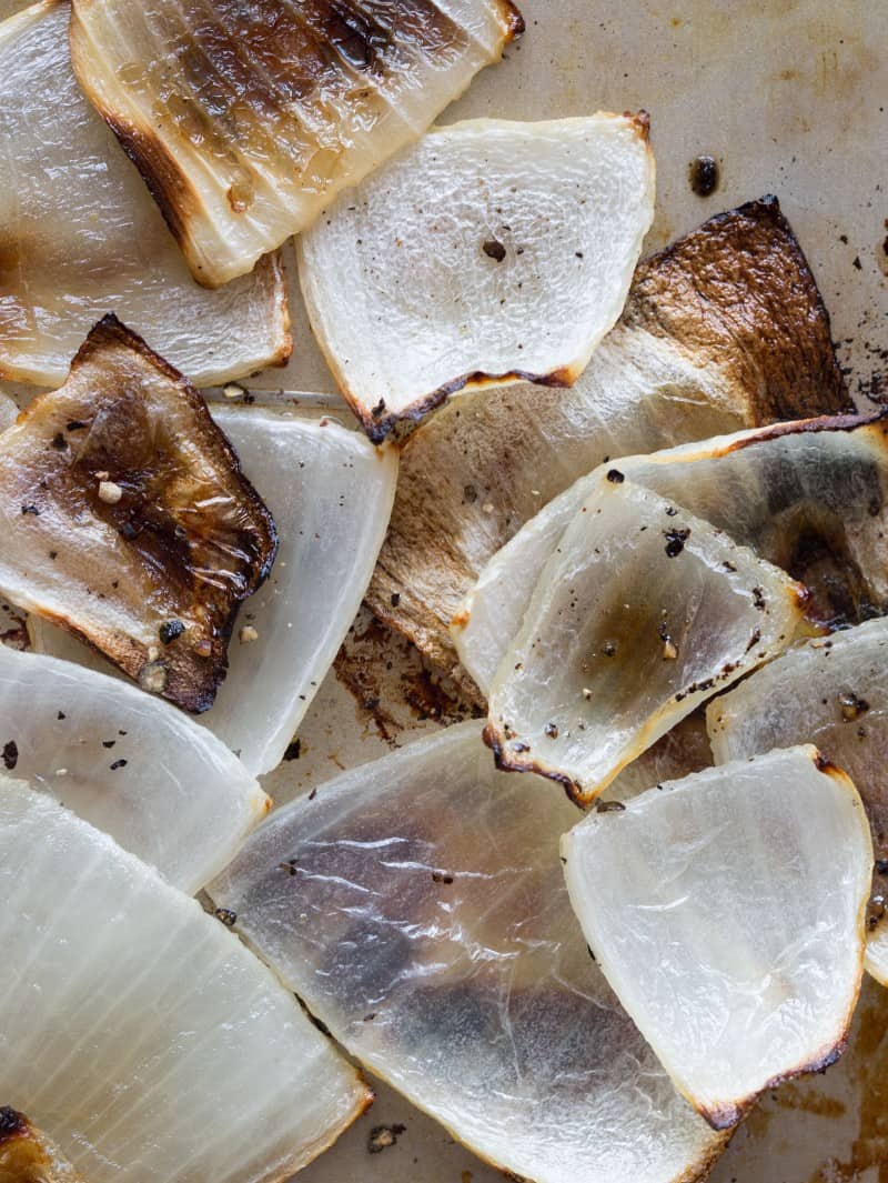 A close up of roasted onions.