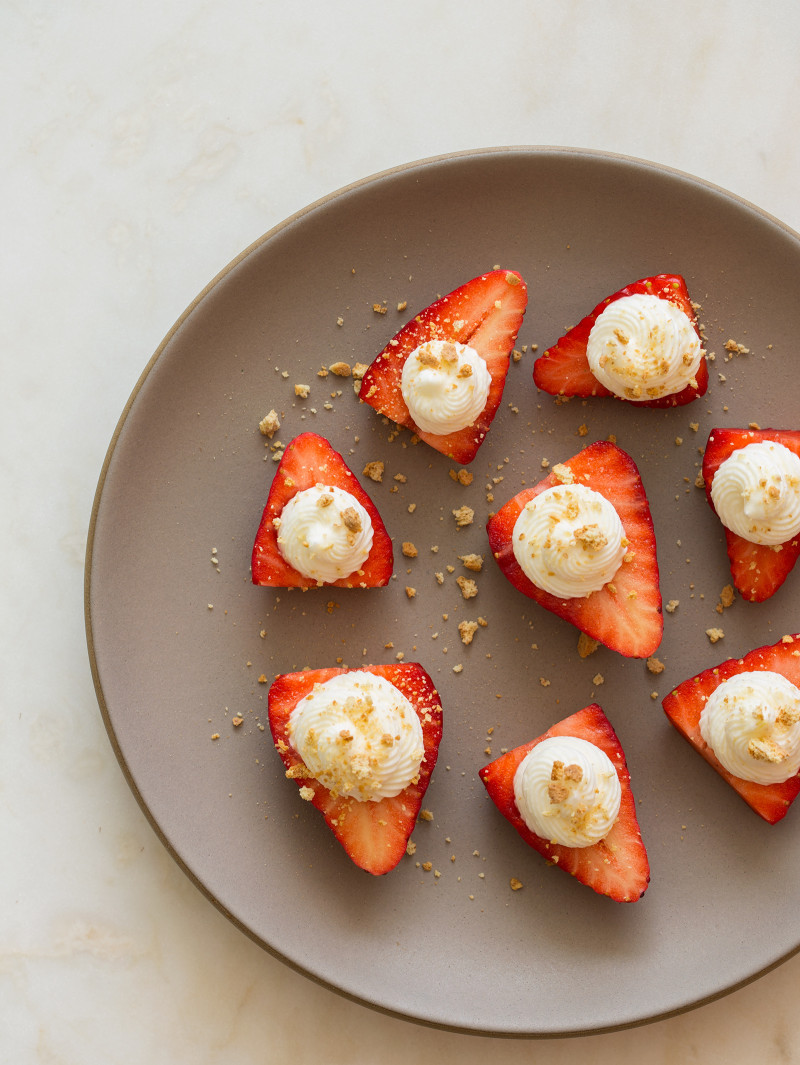 A plate of deviled hearts sprinkled with graham cracker crumbs.