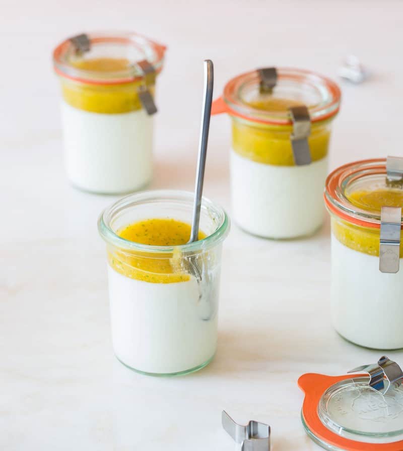 A recipe for Vanilla Bean Panna Cotta with a mango and sage coulis. 