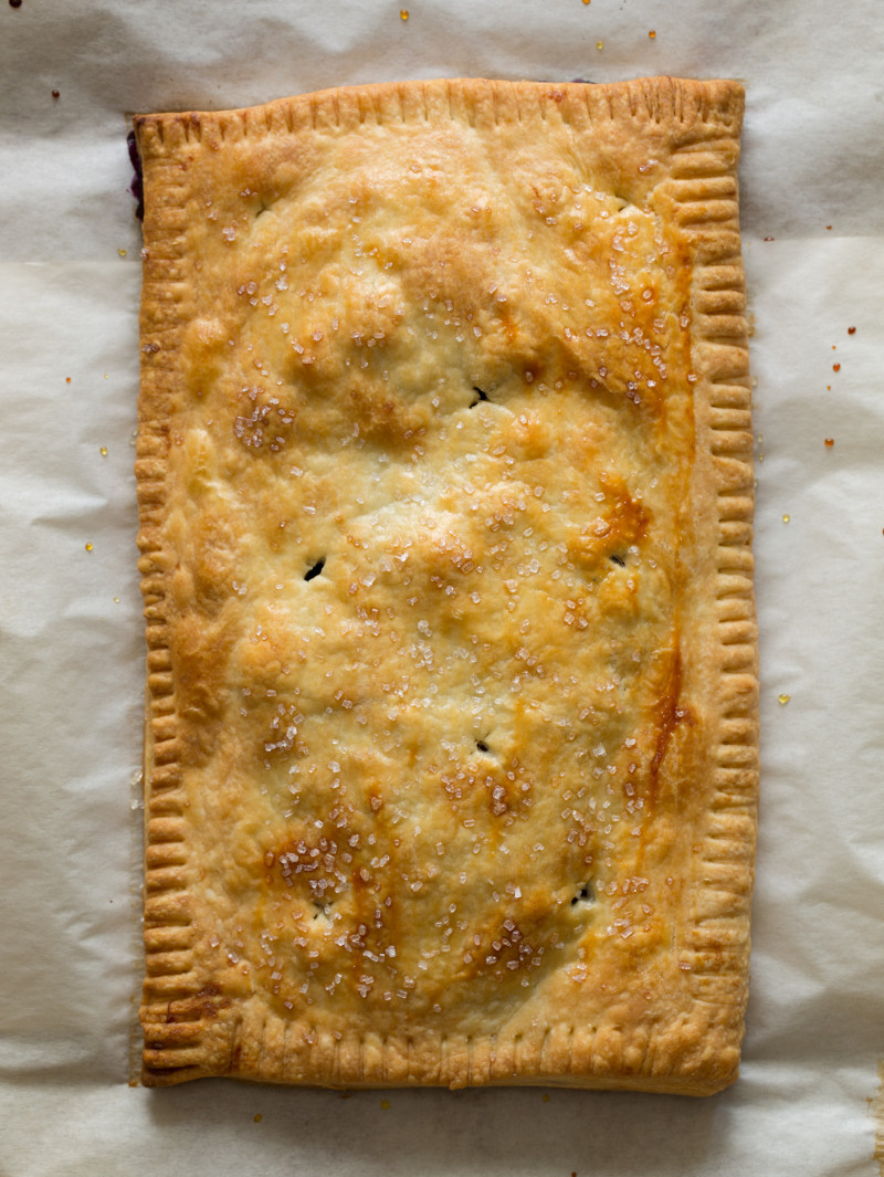 A whole blueberry slab pie.