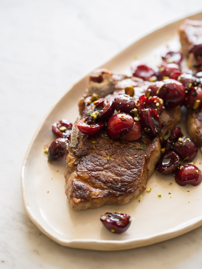 Grilled New York Steak with a Cherry Port Compote Spoon Fork Bacon