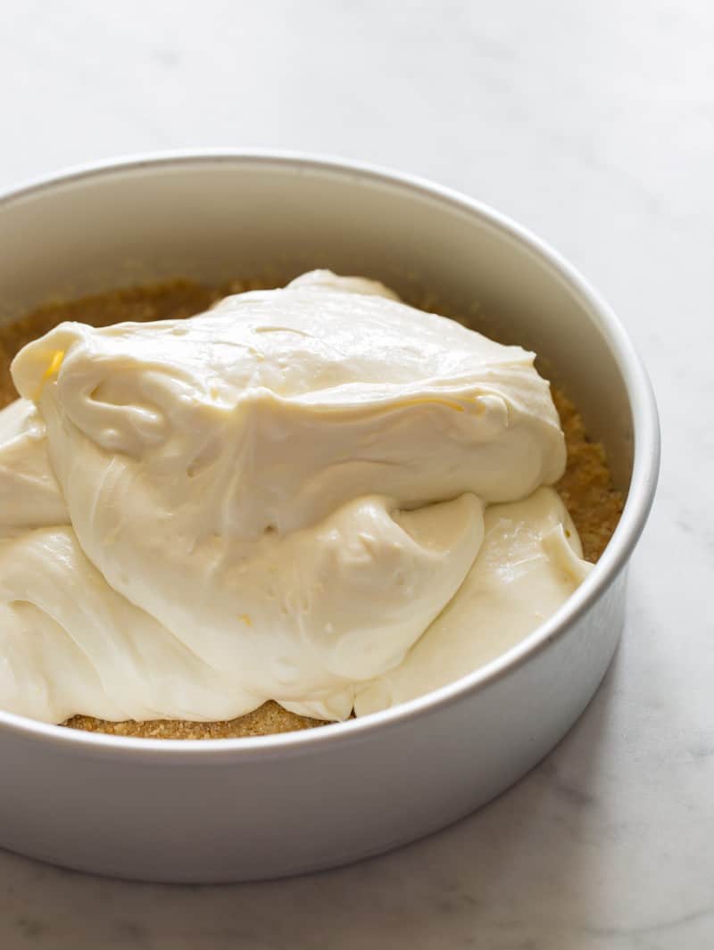 Filling the pan with filling for a Goat Cheese and Yogurt Cheesecake