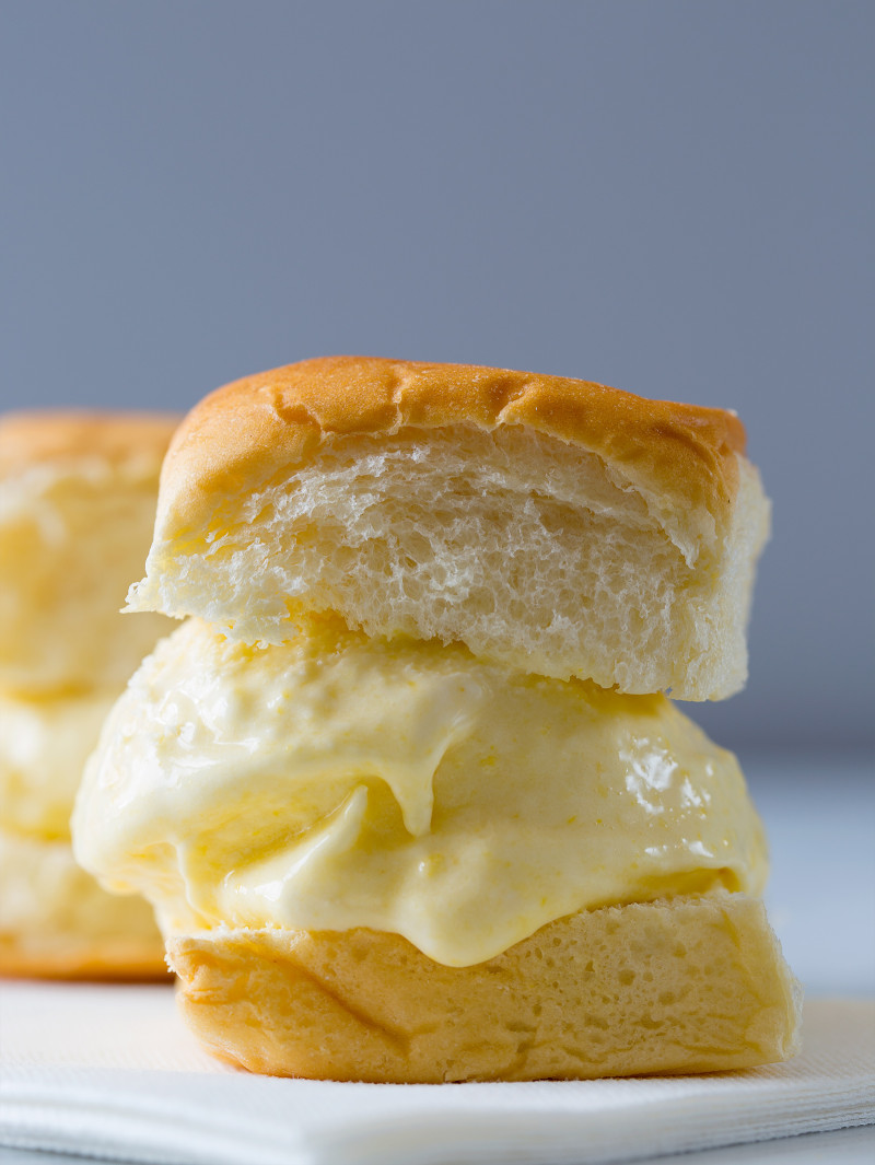 A close up of a sweet corn ice cream sandwich.