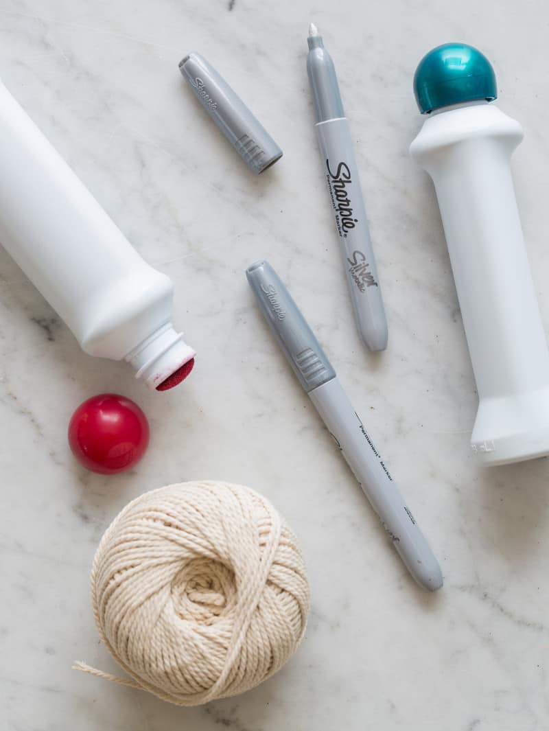 A close up of supplies needed for DIY wine wrapping paper.