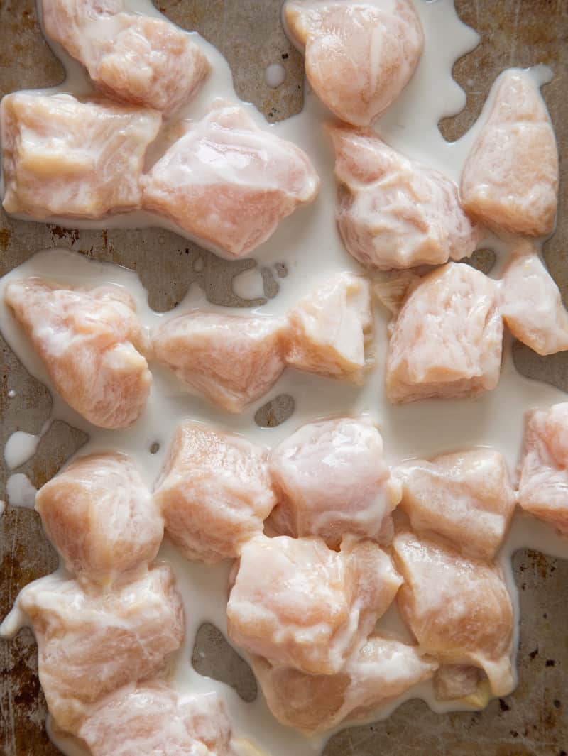 A close up of batter dipped chicken nuggets.