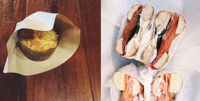 Sandwich halves on a wooden table.