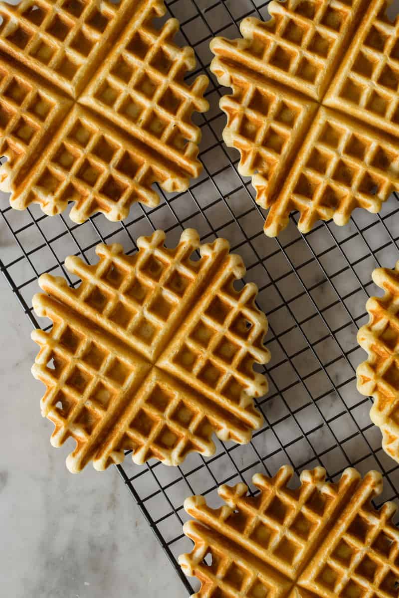 Waffles on a wire rack.