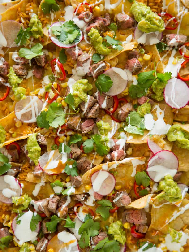 A close up of carne asada nachos.