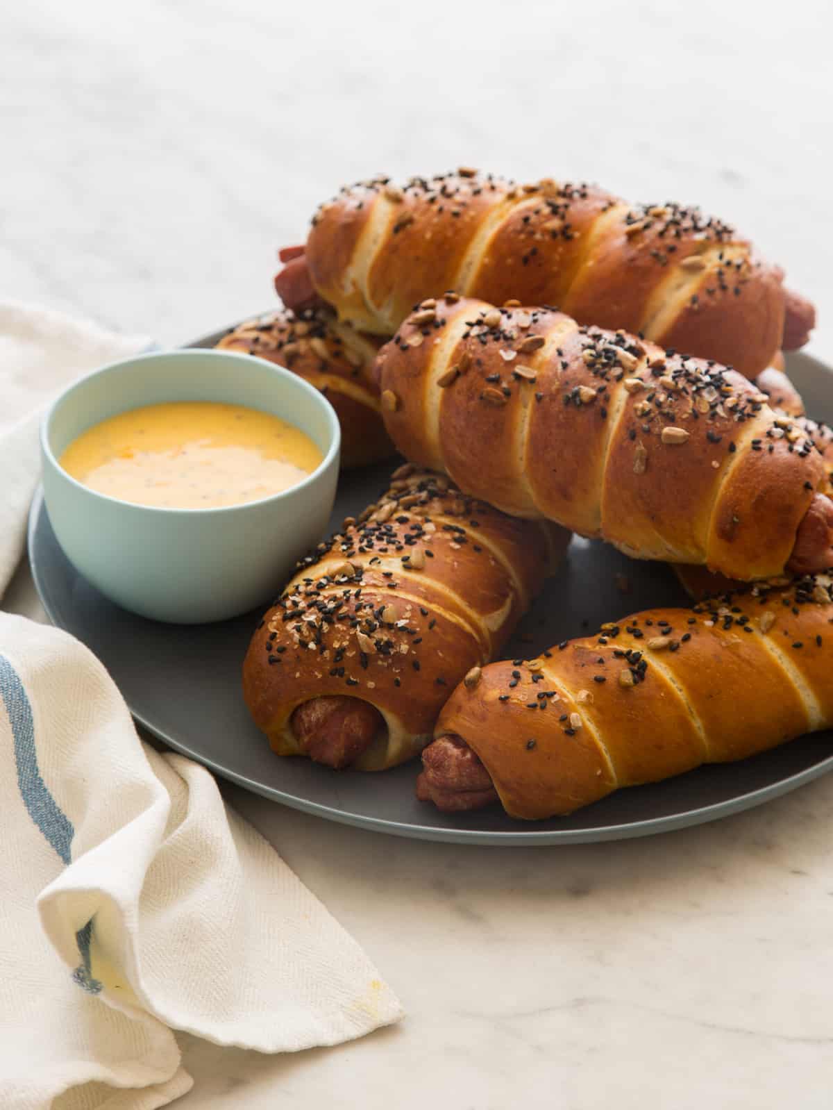 Pretzel Dogs with a Cheese Sauce Spoon Fork Bacon