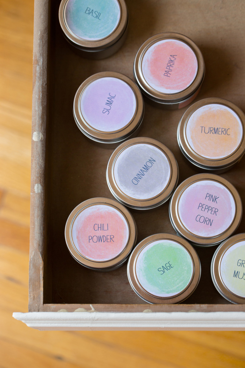 A close up of printed spice labeled containers.