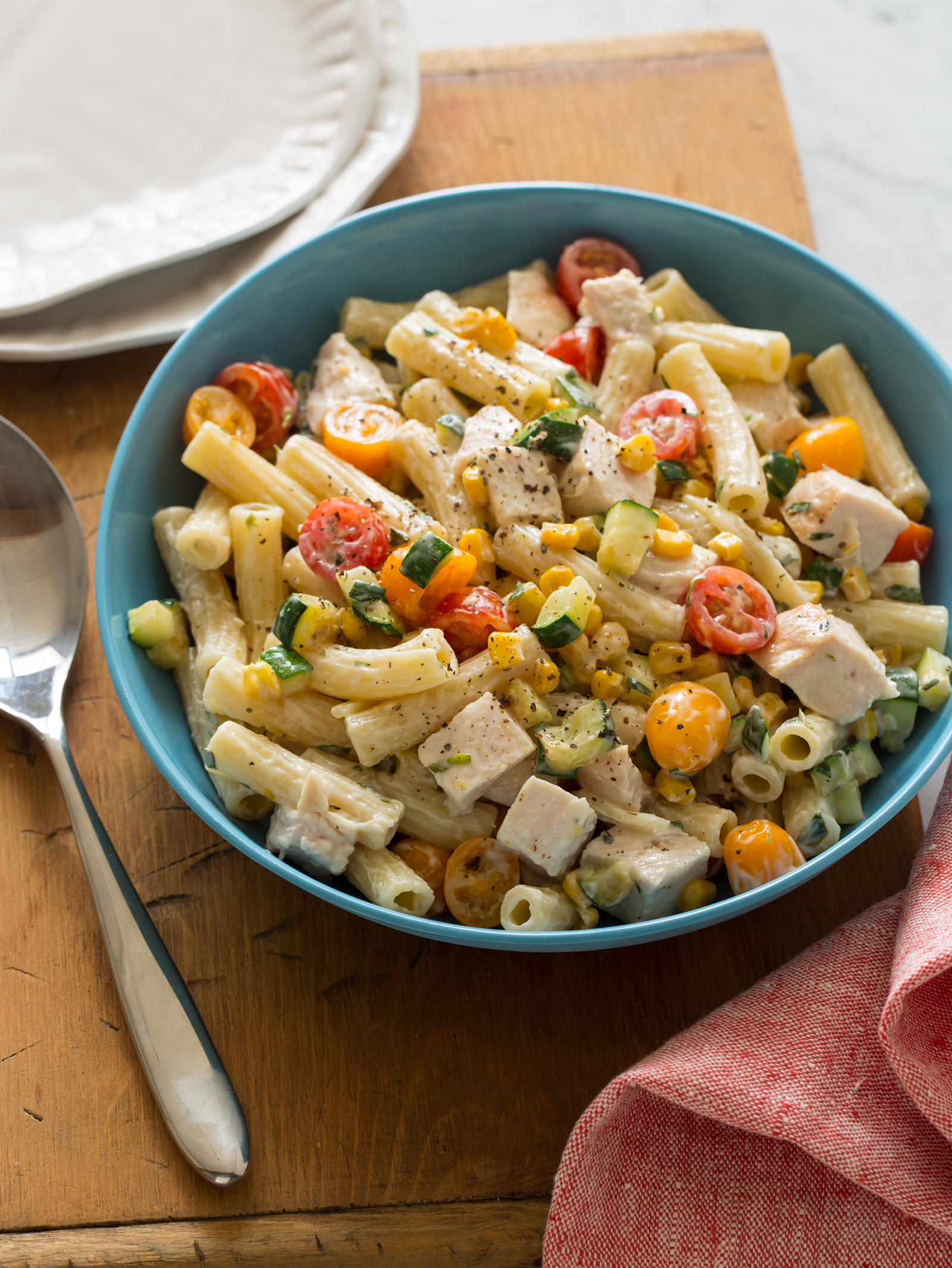grilled-chicken-and-vegetable-pasta-salad-spoon-fork-bacon