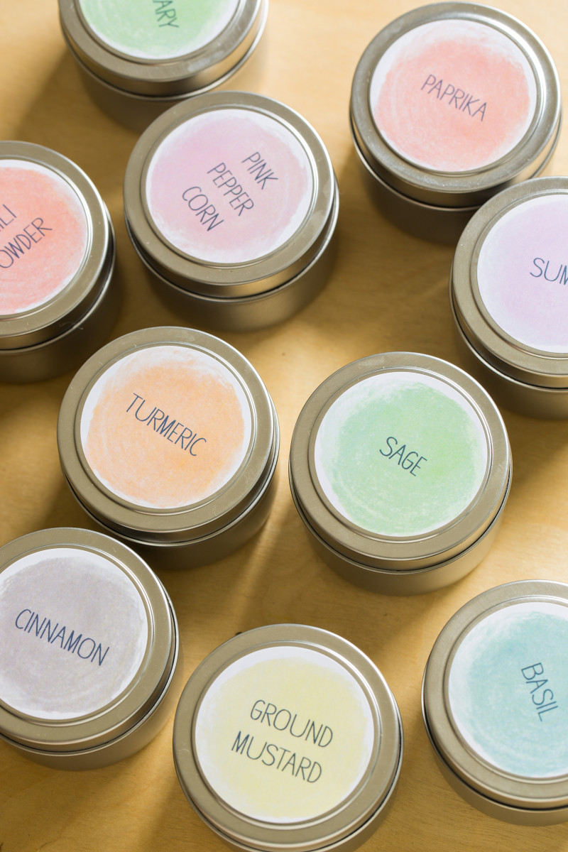 A close up of printed spice labeled containers.