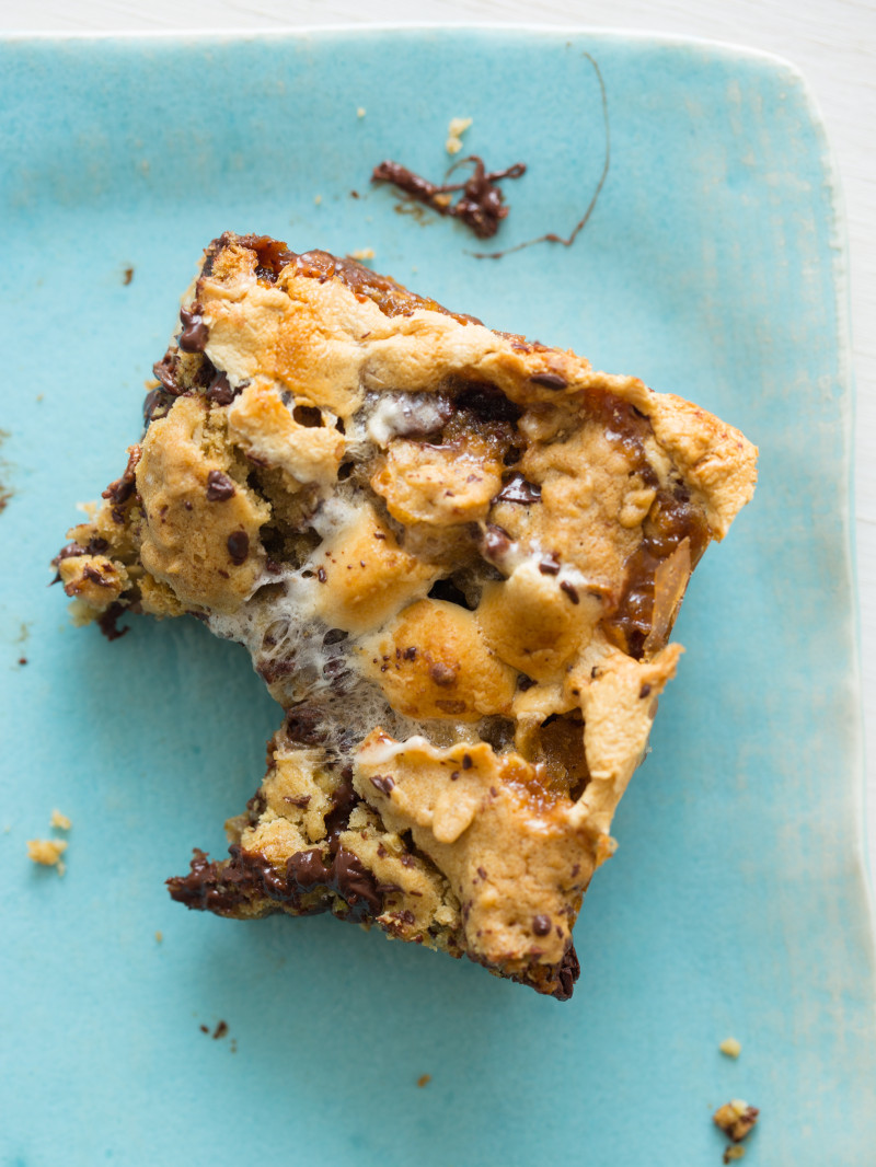 A close up of a partially eaten oatmeal s\'mores bars.