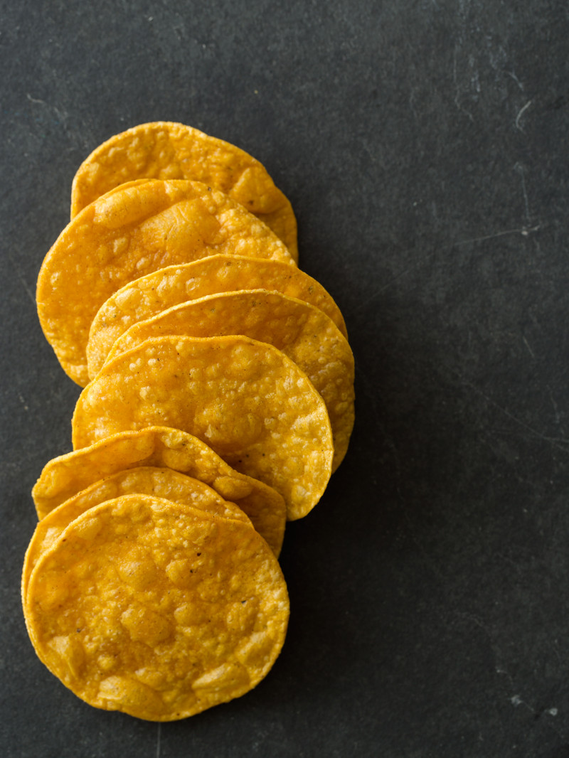 Tostadas stacked and lined up.