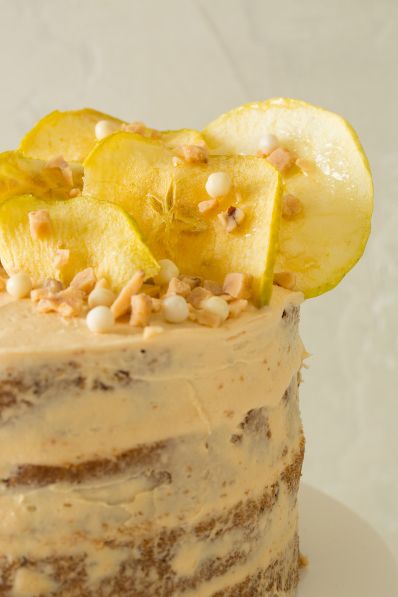 A close up of the apple decorations on the apple thyme cake with salted caramel buttercream.