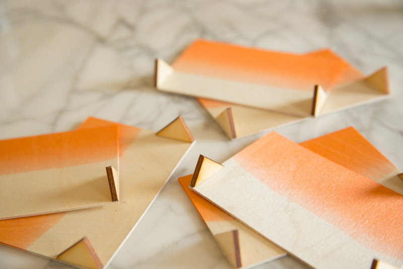 glued balsa wood triangles to stand the place cards