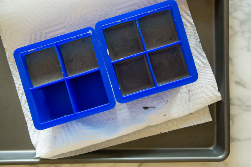 Blue silicone ice cube trays for cement mold.