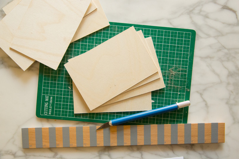 cut balsa wood to make this place card DIY