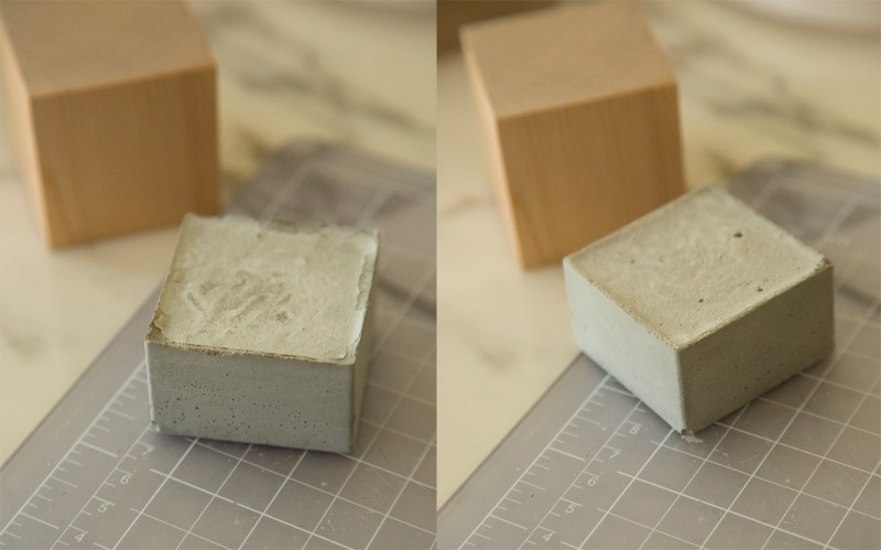 Cement cubes next to wooden cubes.