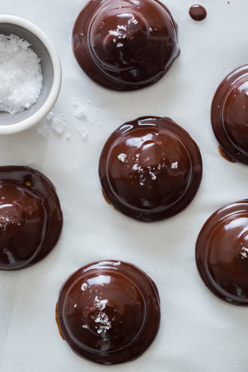 Gingersnap and marshmallow covered in chocolate with salt on the side.