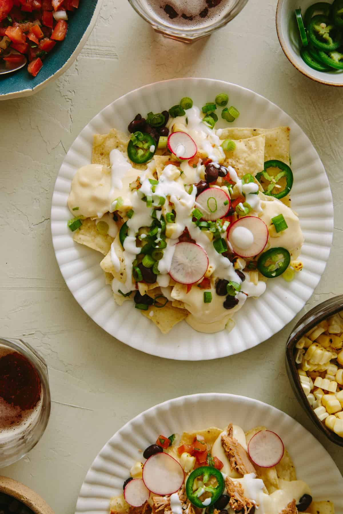 Diy Nacho Bar With A Creamy Queso Sauce Spoon Fork Bacon