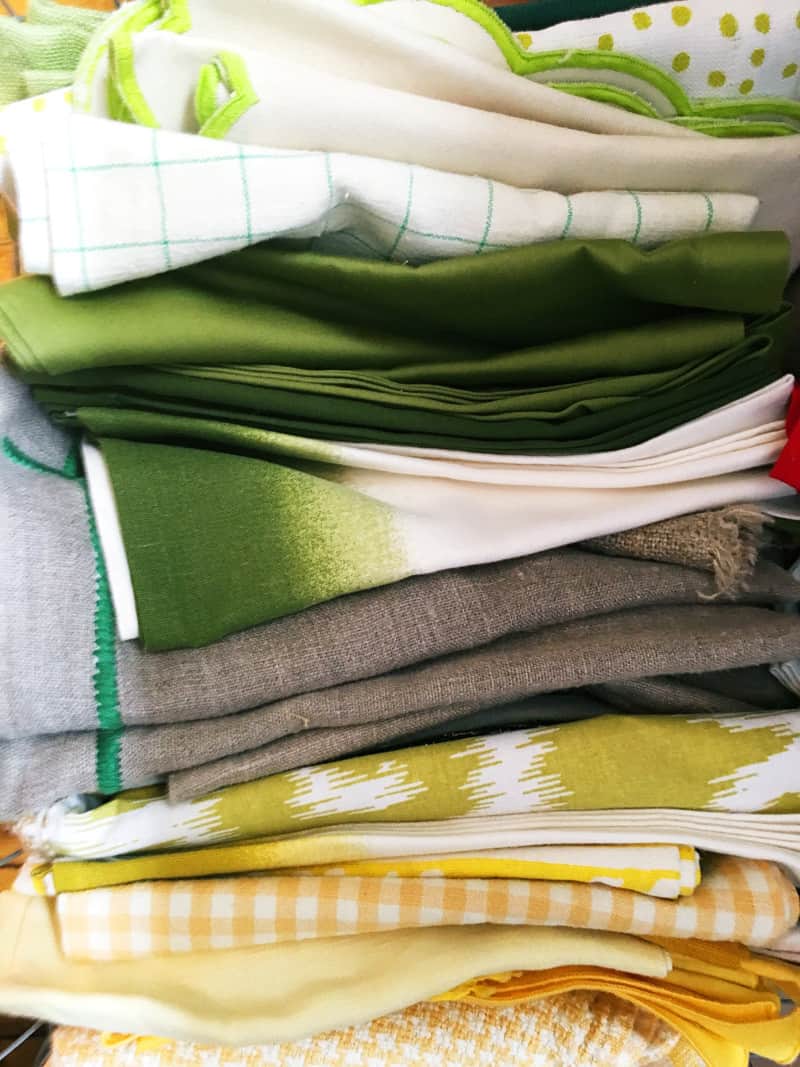 A close up of green and yellow napkins.