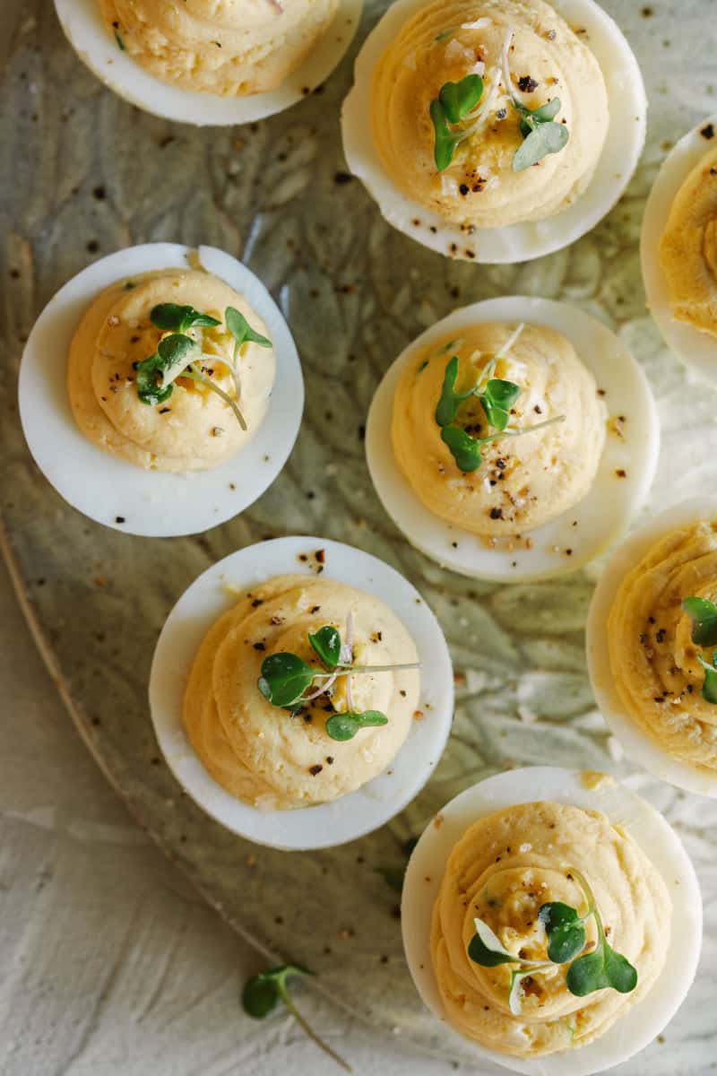 A close up of Caramelized onion and herb deviled eggs.