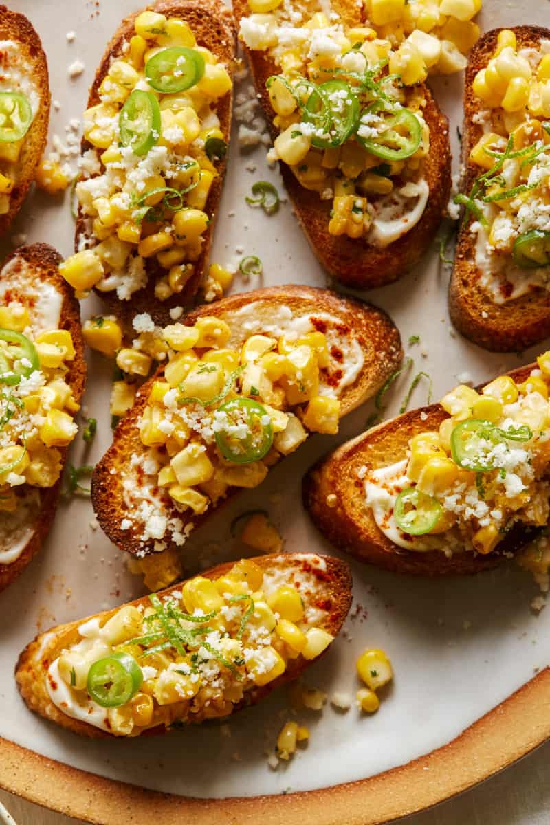 A close up of elote bruschetta.