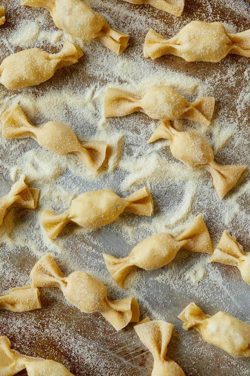 Raw lobster, corn, and tarragon caramelle in semolina flour.