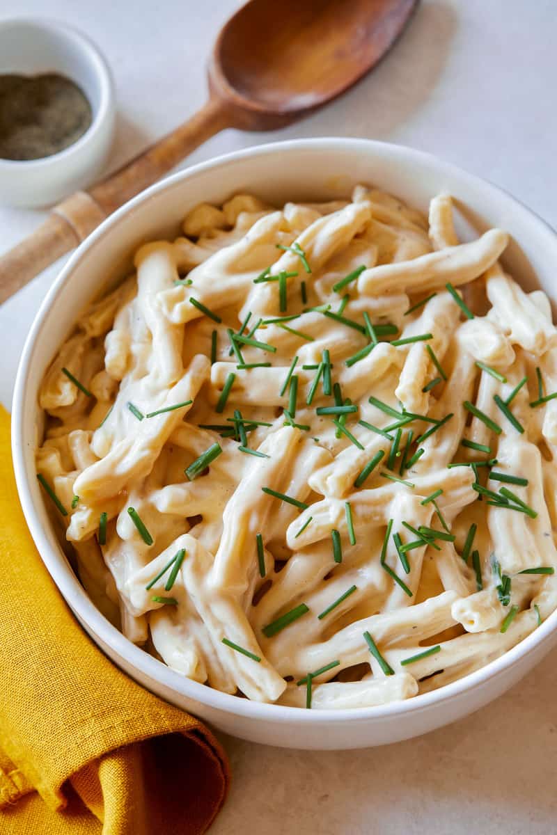 A close up of a bowl of vegan stovetop mac and cheese. 