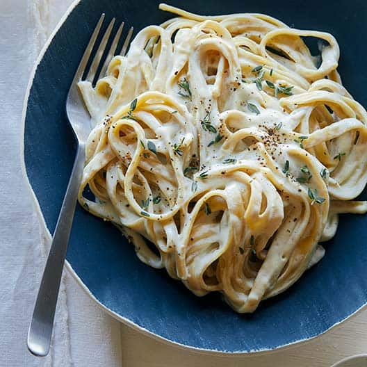 Roasted Garlic Vegan Fettuccine Alfredo Spoon Fork Bacon