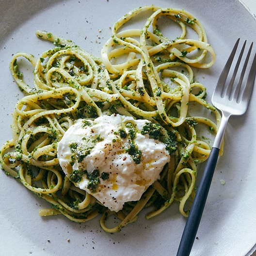 Burrata Topped English Pea, Basil Pistachio Pesto with Linguine