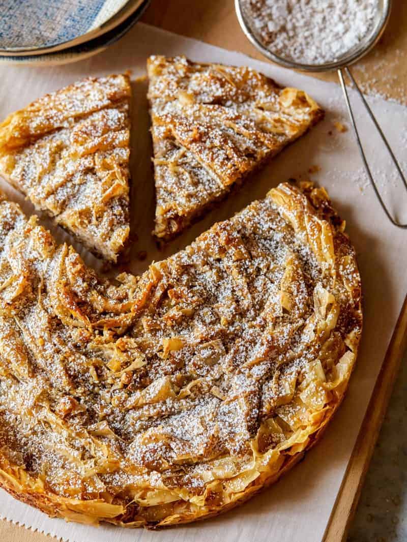 A sliced chai spiced ruffled milk pie.