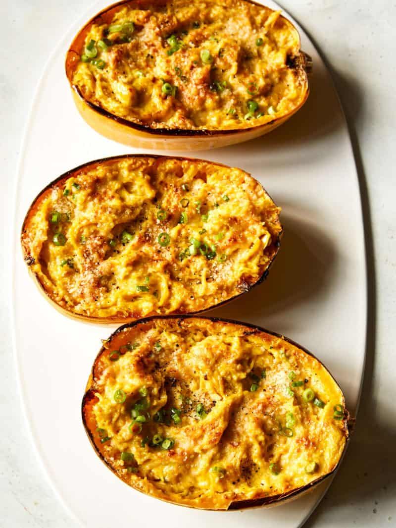 Vegan baked alfredo spaghetti squash on a plate.