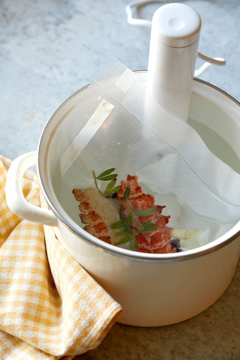 Food saved package of lobster in a white pot.