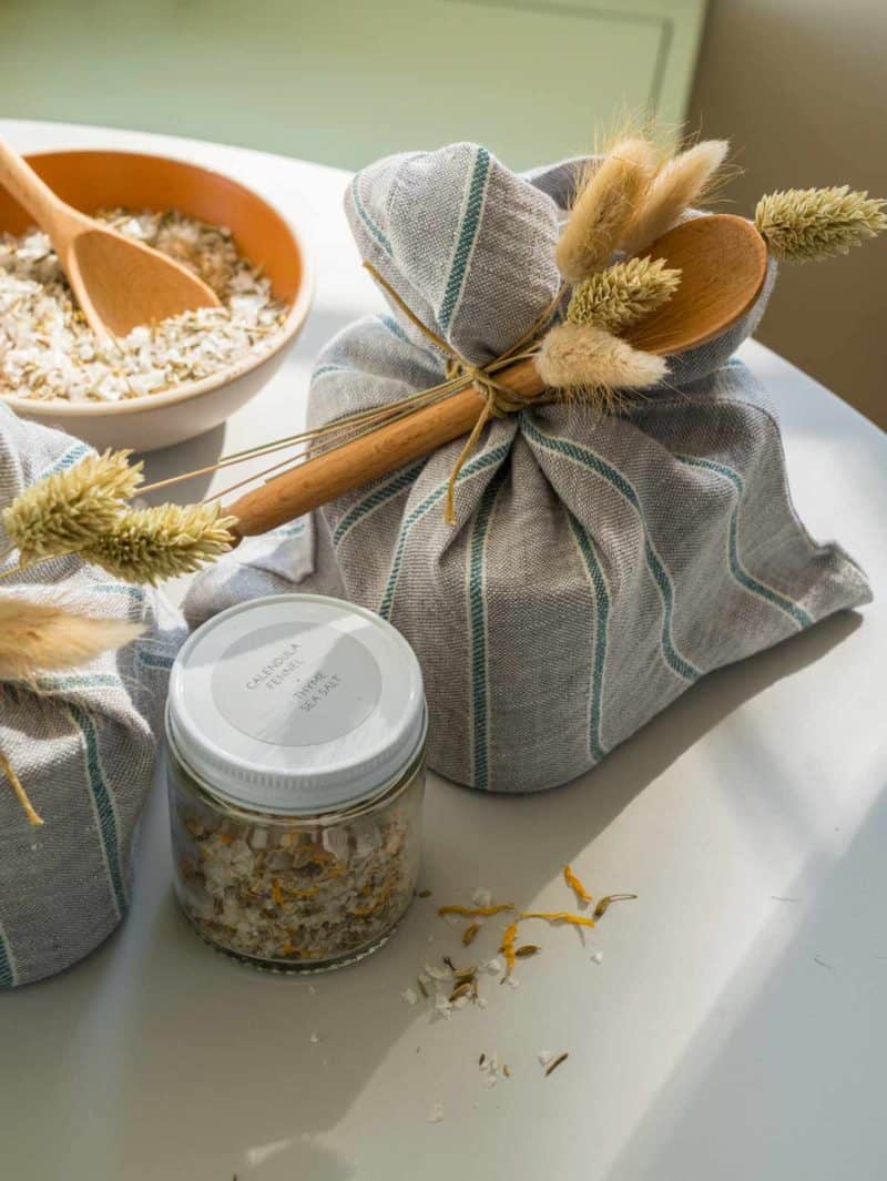 Bowl, jar, and bag of mixed salt gifts.