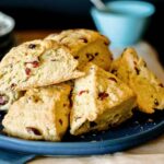 Cranberry Orange scones close up on a plate.