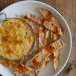 A recipe for a creamy Artichoke and Roasted Garlic Dip.