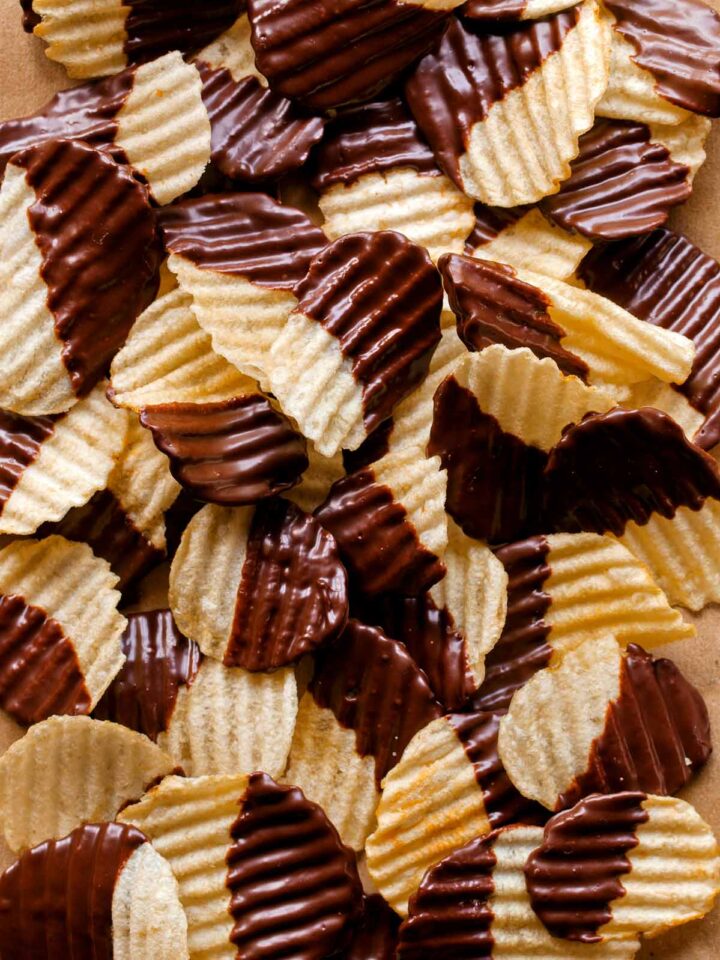 A close up of chocolate covered potato chips.