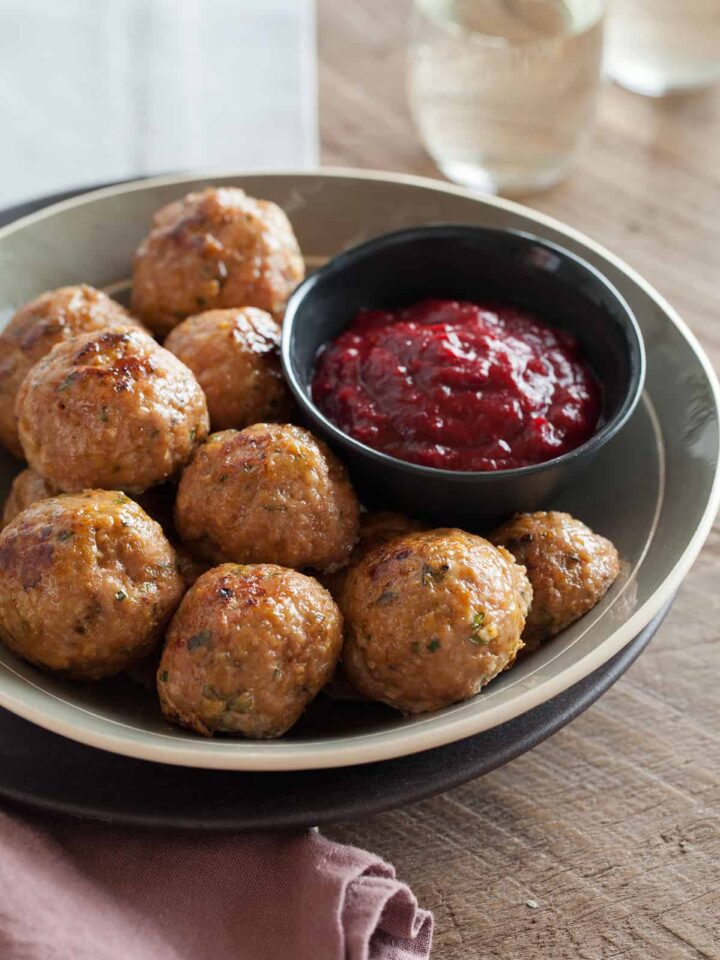Perfect holiday recipe for Herbed Turkey Meatballs with a Barbeque Cranberry Sauce.