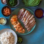 Ingredients in bowls and on plates for bo ssam.