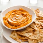 A recipe for Sweet Potato Hummus with Cumin Flatbread Chips.