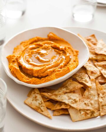 A recipe for Sweet Potato Hummus with Cumin Flatbread Chips.
