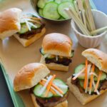 Pork Belly Sliders with pickled daikon and carrots.
