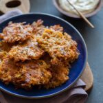 Root Vegetable Fritters served with sour cream.